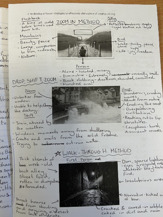 A close-up of a notebook with text and photographs