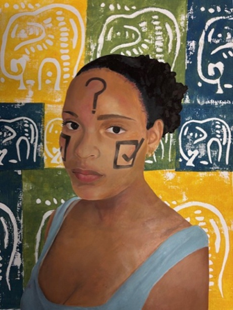 Photograph of a person wearing a light blue sleeveless top standing in front of a colourful wall with a repeating pattern of stylized white elephant designs on yellow, green, and blue blocks. The background creates a vibrant, artistic setting with a mix of warm and cool tones.