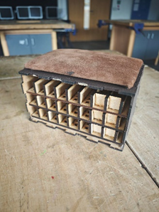 A small box with small holes