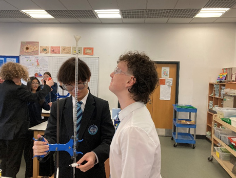 students completing a titration practlcal