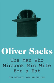 blue cover with a black hat cover of the book  - The Man who Mistook his Wife for a Hat’ by Oliver Sacks