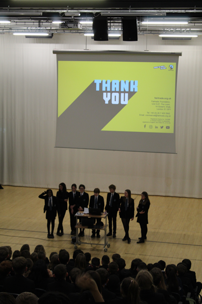 This image shows the International School Leaders at the end of their presentation  in assembly 