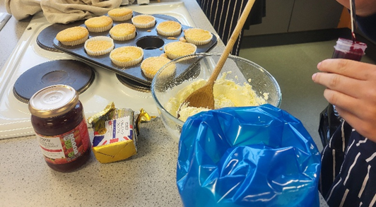 A person making food in a kitchen