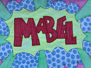 a piece of work showing a name  based on Pop art theme looking at Roy Lichtenstein and Andy Warhol   