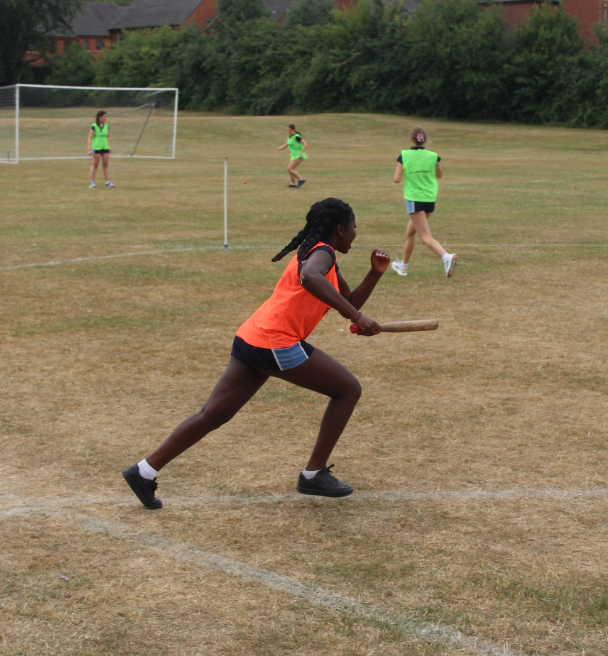 girls playing rounders