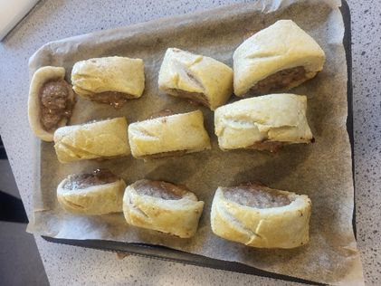a tray of ten sausage rolls