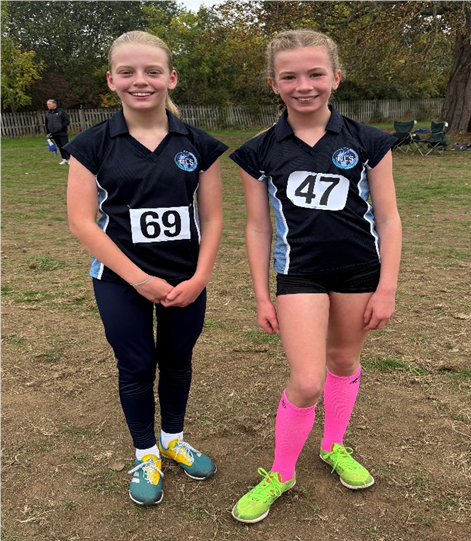 two girls in their PE kit after running cross country