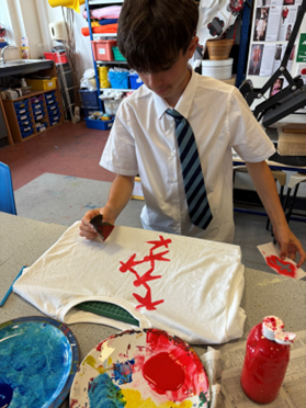 a student stencil printing and hand stitch techniques