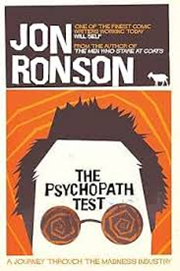 Book cover of The Psychopath Test: A Journey Through by Jon Ronson which is brown and orange and  features a face on the cover 