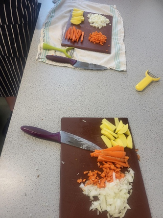 A cutting board with vegetables on it