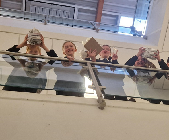 FOUR STUNDETS DROPPING THEIR EGGS IN THE EGG CHALLENGE