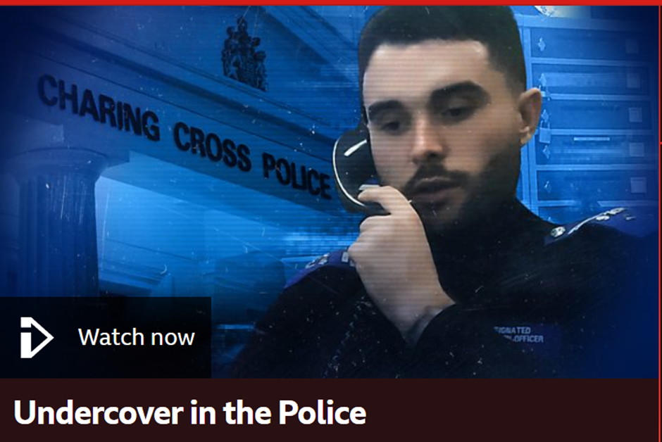 a policeman taking a call