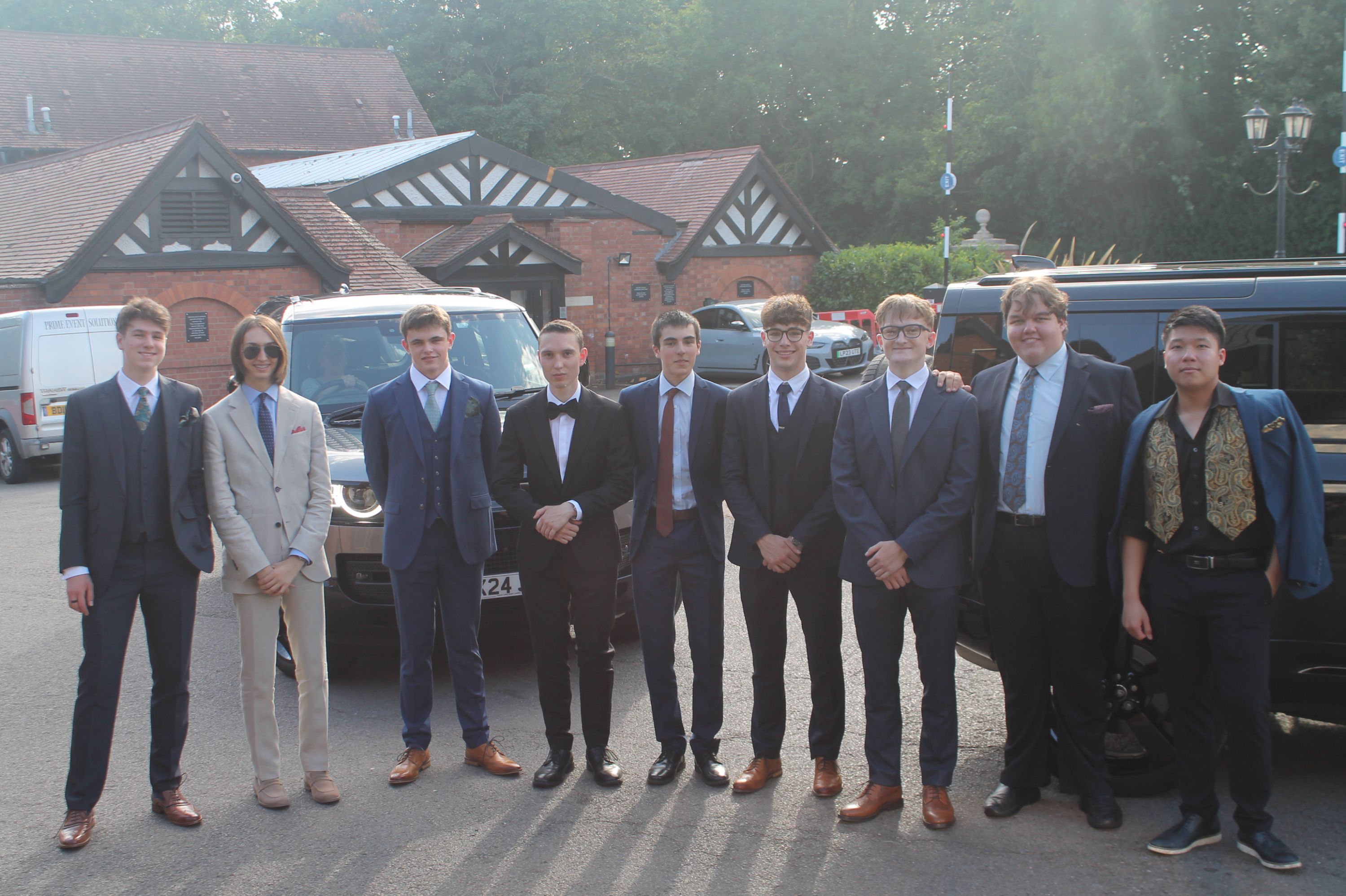 a group of 9 students at their prom