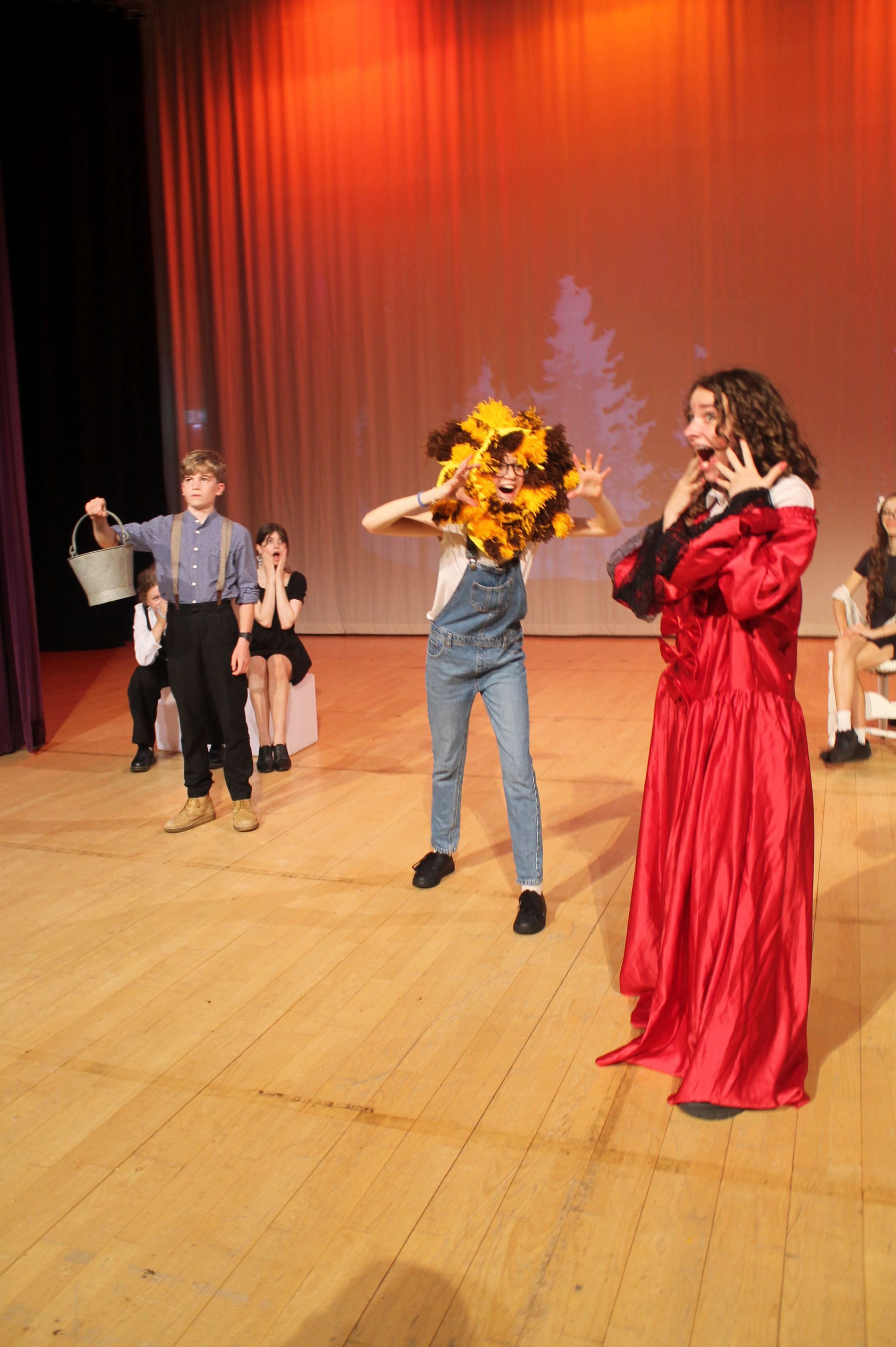 five of the cast of the production