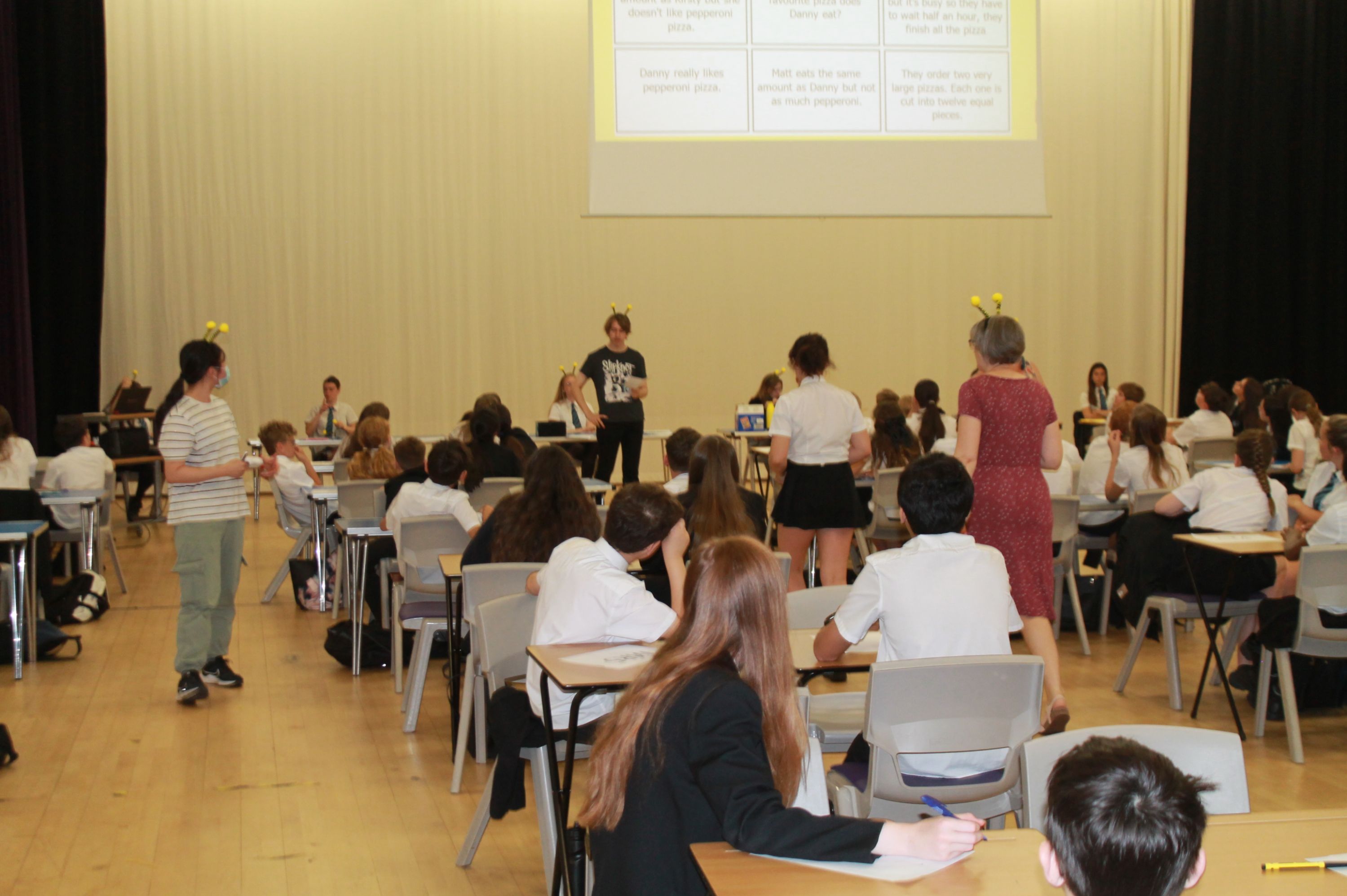 students in the hall enjoying maths bee