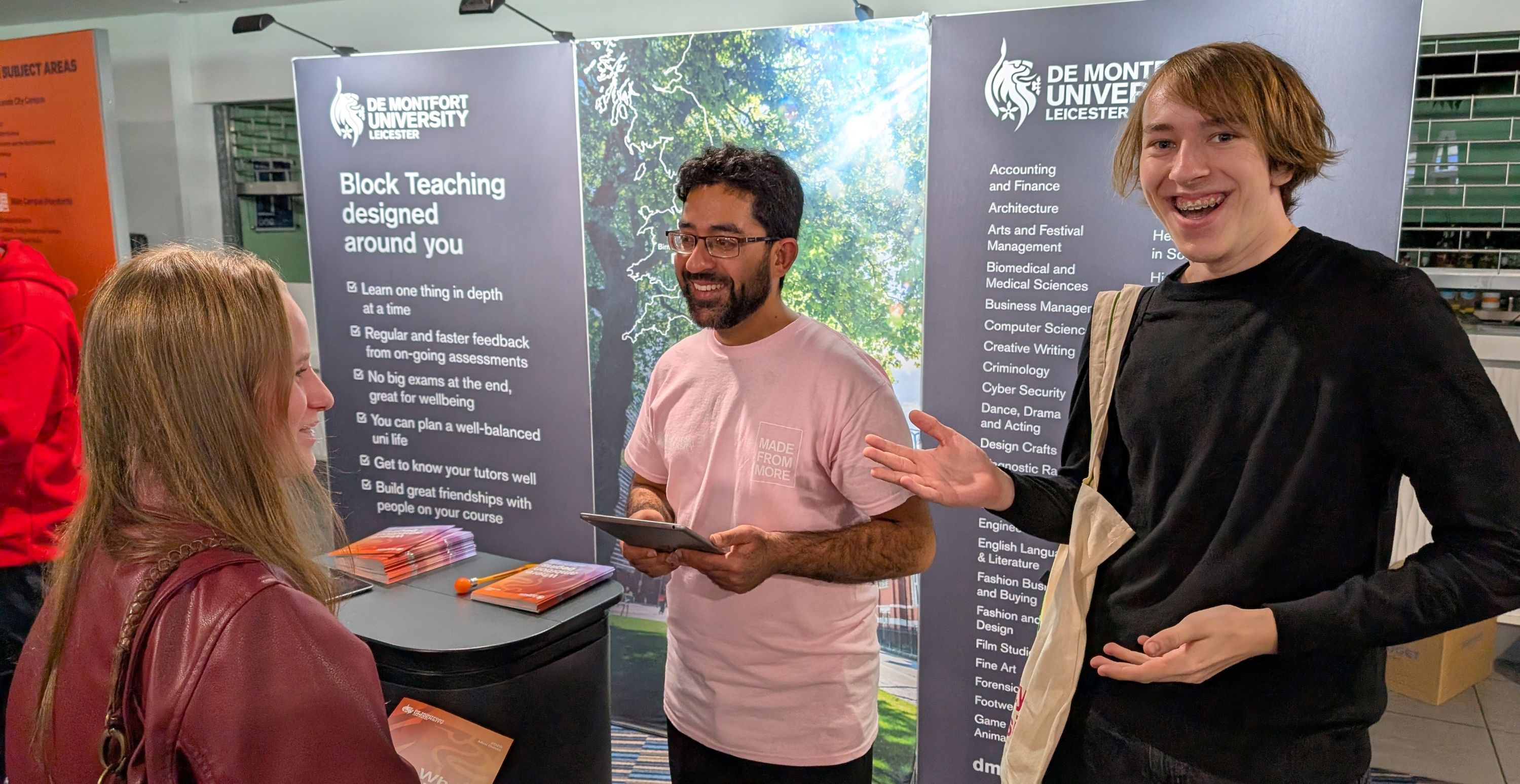 three people talking together