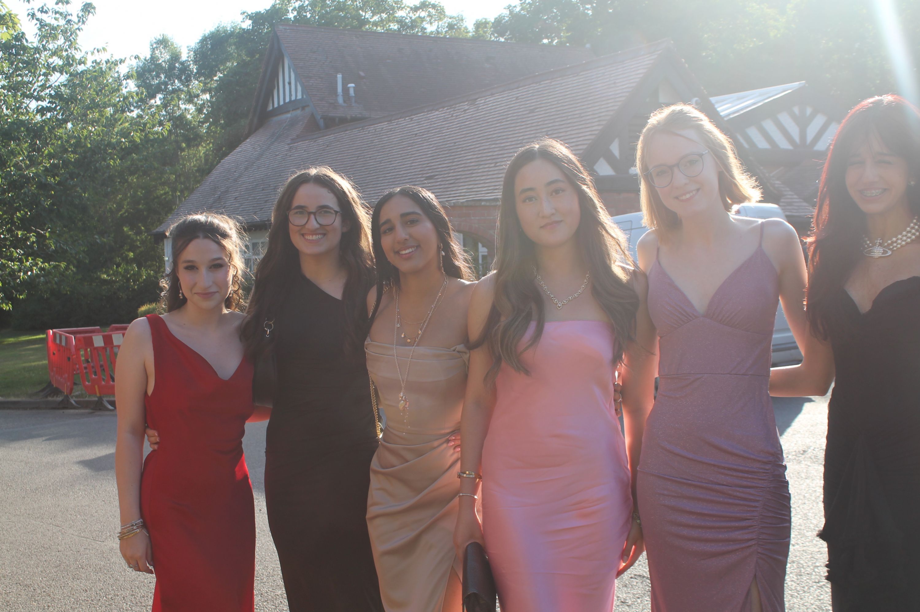 a group of 6 students at their prom