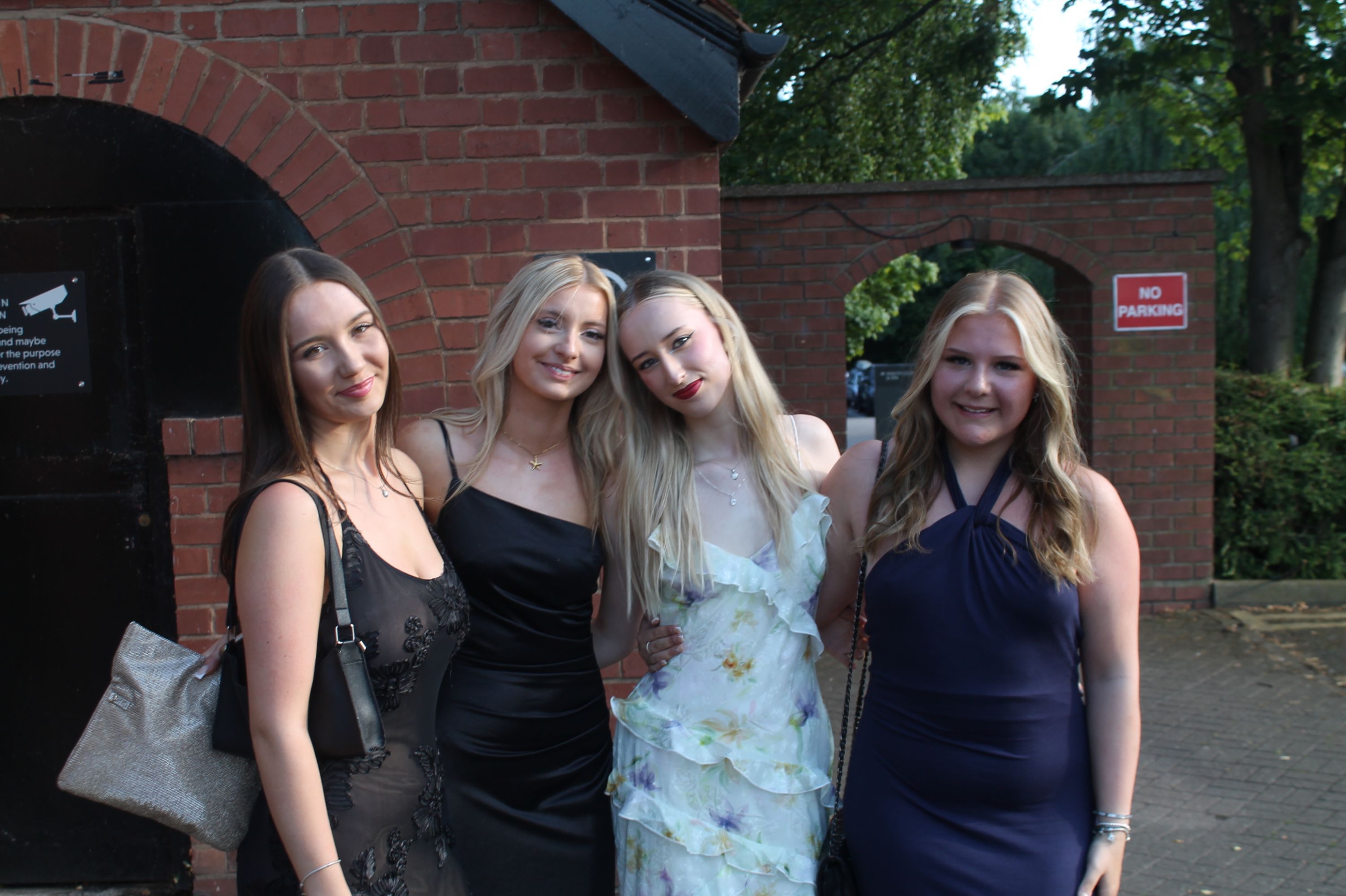 a group of 4 students at their prom