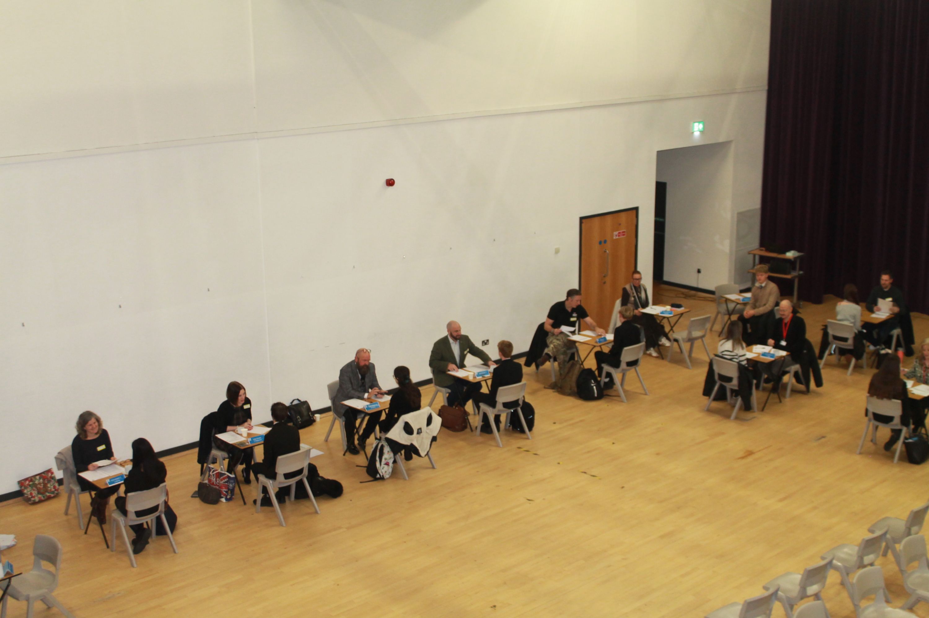 a view of the interviews taking place in the theatre