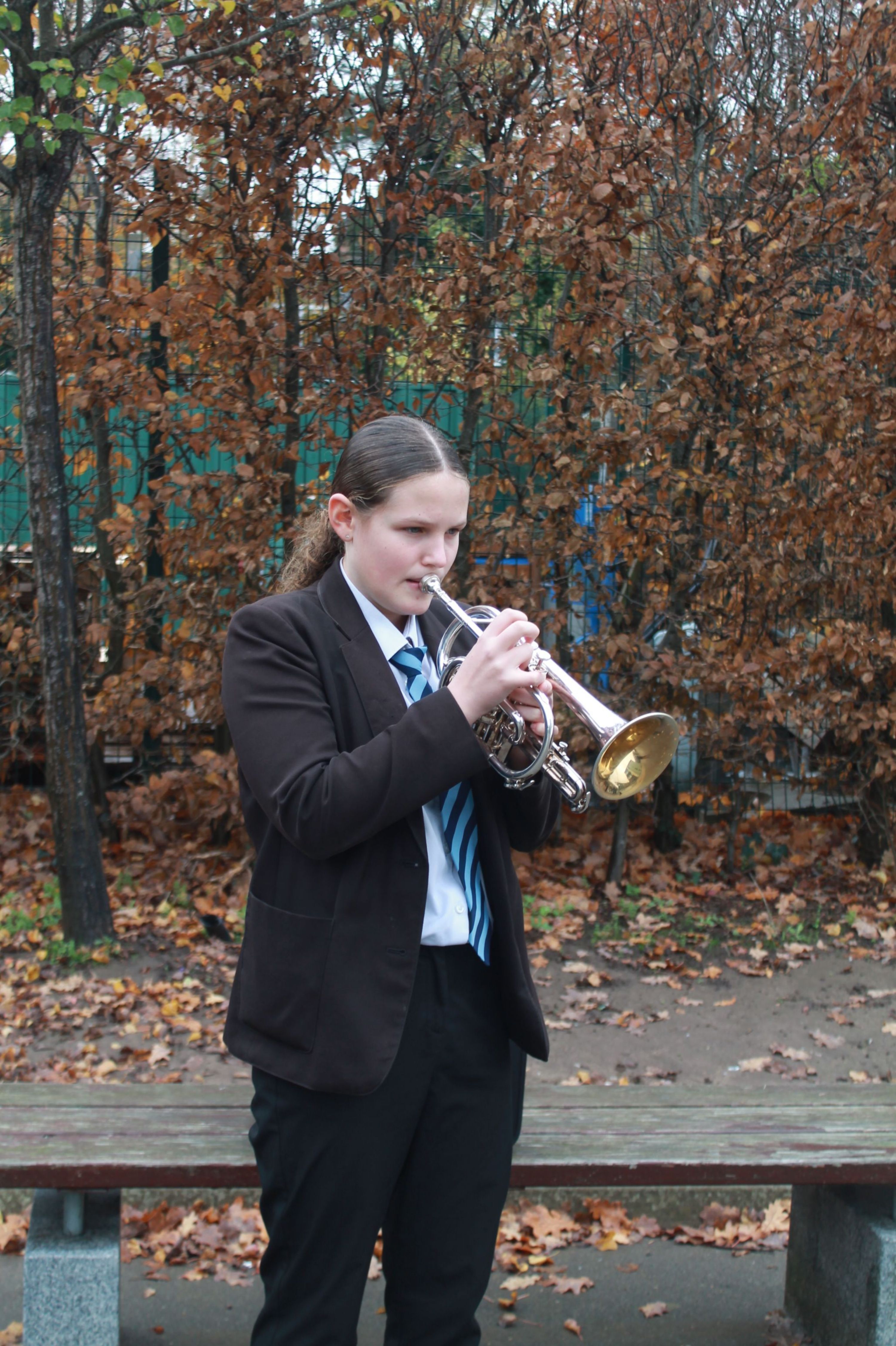 a student playing the trumpet