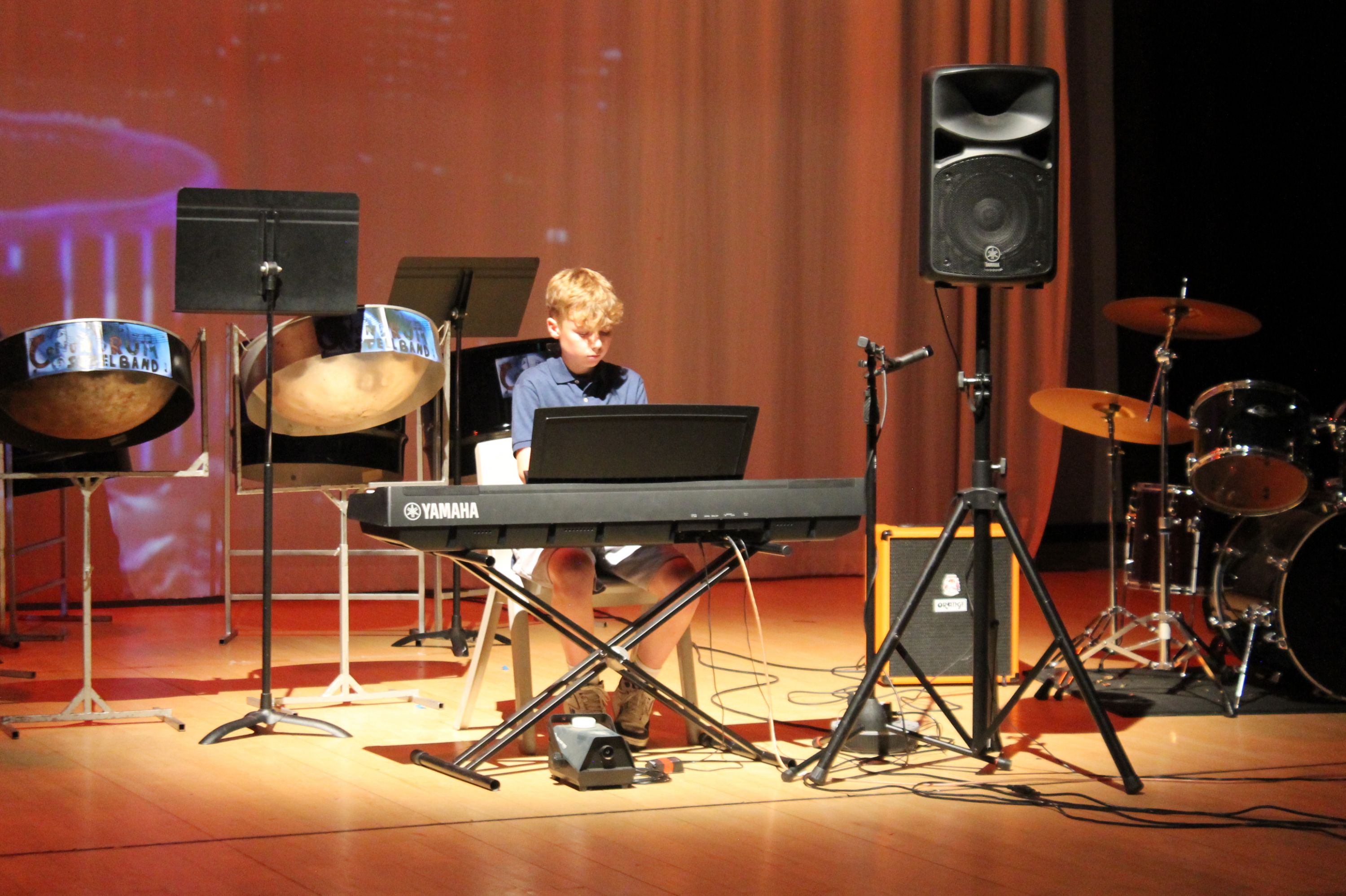 a student playing keyboard
