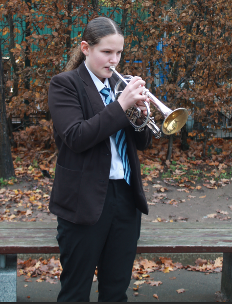 a student playing a trumpet