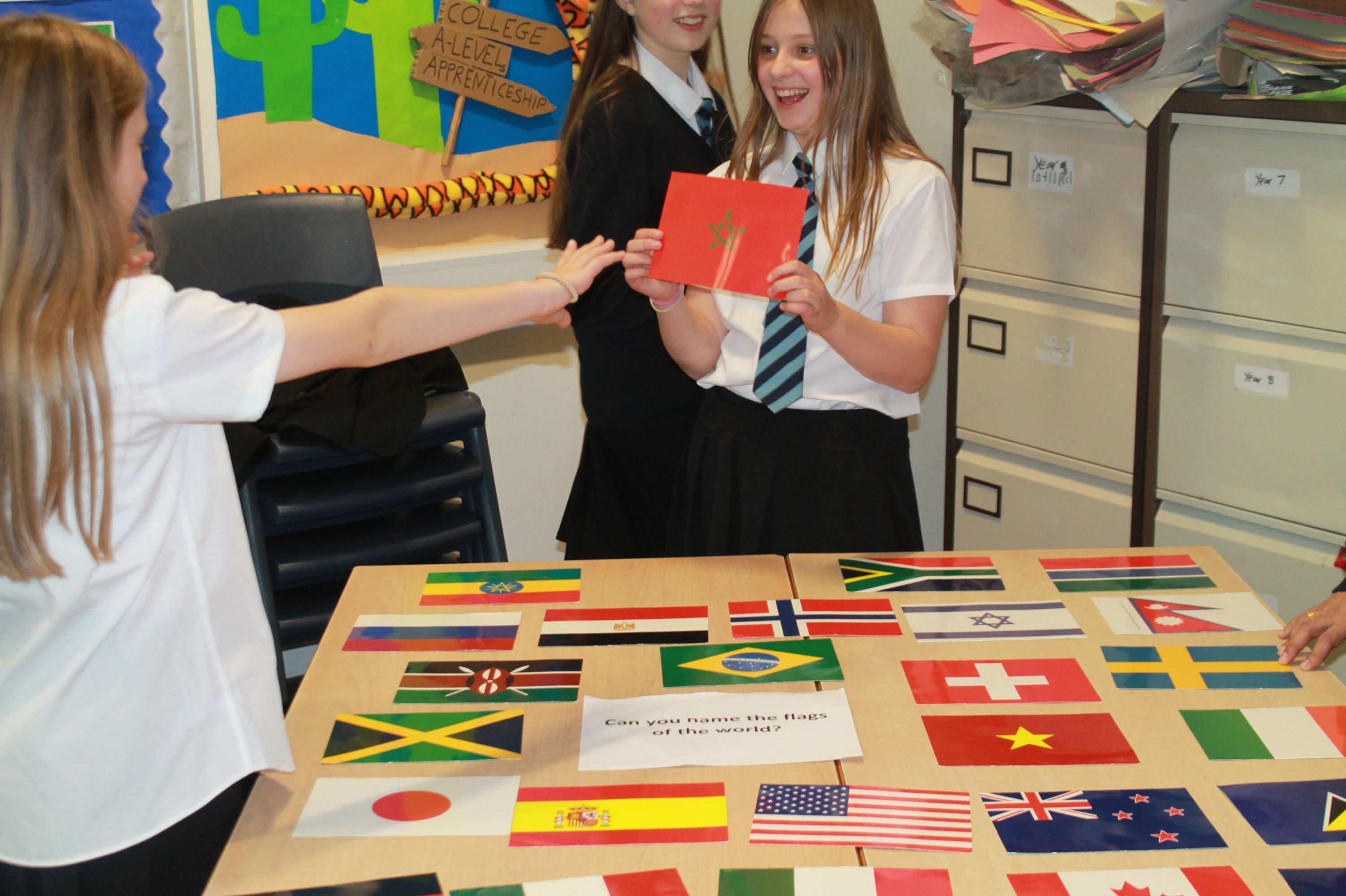 a girl guessing flags in Geography classroom 