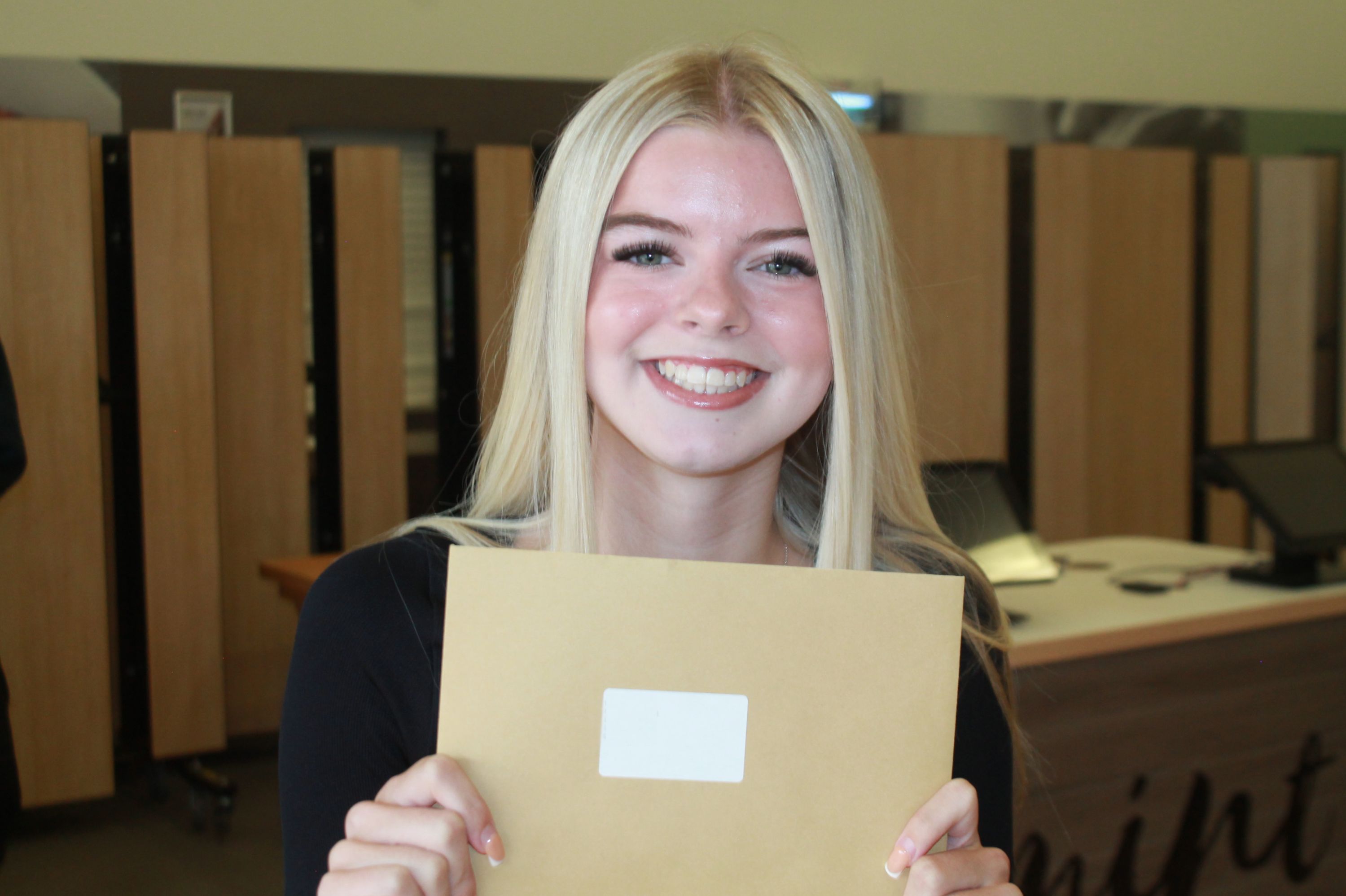a student having collected their GCSE results
